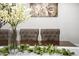 Elegant dining area featuring a wood table, upholstered chairs, and a decorative floral arrangement at 10617 W Daley Ln, Peoria, AZ 85383