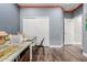 Spacious flex room with hardwood floors and a view of another room via an open door at 10738 W Rowel Rd, Peoria, AZ 85383
