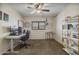 Bedroom with carpet floors, ceiling fan, and desk at 10923 E Flower Ave, Mesa, AZ 85208