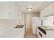Functional kitchen with ample cabinet space and modern appliances at 1208 E Lawrence Ln, Phoenix, AZ 85020