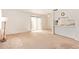 Open-concept living room with sliding doors leading to the outdoor patio at 1208 E Lawrence Ln, Phoenix, AZ 85020