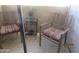 Cozy balcony furnished with cushioned seating, ideal for relaxing outdoors at 12221 W Bell Rd # 209, Surprise, AZ 85378