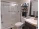 Neat bathroom featuring a glass-enclosed shower and contemporary fixtures at 12221 W Bell Rd # 209, Surprise, AZ 85378