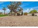 Large backyard with shed and gravel, offers potential for landscaping and customization to create your dream outdoor space at 12821 N 67Th St, Scottsdale, AZ 85254