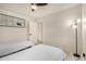 Well-lit bedroom featuring two comfortable beds, modern lighting, and neutral decor at 12821 N 67Th St, Scottsdale, AZ 85254