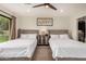 Bright bedroom with two comfortable beds and nice view of the backyard at 12821 N 67Th St, Scottsdale, AZ 85254