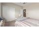Bedroom featuring a bed and a closet at 13304 W Stella Ln, Litchfield Park, AZ 85340