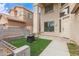 Charming front yard featuring low maintenance landscaping, neutral color palette, and entry walkway at 13304 W Stella Ln, Litchfield Park, AZ 85340