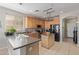 Functional kitchen with ample counter space and modern appliances, ideal for cooking enthusiasts at 13304 W Stella Ln, Litchfield Park, AZ 85340