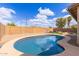 Refreshing pool with a clean design, surrounded by a patio area, ideal for relaxation and enjoyment at 13304 W Stella Ln, Litchfield Park, AZ 85340