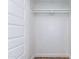 Walk-in closet featuring a wooden floor and shelving at 1334 W Sells Dr, Phoenix, AZ 85013