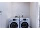Laundry room equipped with side by side washing machine and dryer at 1334 W Sells Dr, Phoenix, AZ 85013