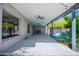 Covered patio with ceiling fans offering a seamless transition to outdoor living at 1334 W Sells Dr, Phoenix, AZ 85013
