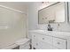 Bathroom features a modern vanity and updated mirror at 13521 E Butler St, Chandler, AZ 85225