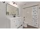 Bathroom features a modern vanity and updated mirror at 13521 E Butler St, Chandler, AZ 85225