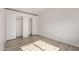 Bedroom features updated flooring and a closet with sliding doors at 13521 E Butler St, Chandler, AZ 85225