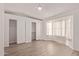 Bedroom features updated flooring and a closet with sliding doors at 13521 E Butler St, Chandler, AZ 85225