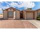 Charming single-story home with desert landscaping and attached garage at 13521 E Butler St, Chandler, AZ 85225