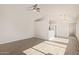 Bright living room with ceiling fan and wood-look flooring at 13521 E Butler St, Chandler, AZ 85225