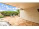 Patio features a built in barbeque, stone tile, covered patio, outdoor furniture and a fire pit at 1375 W Belmont Red Trl, San Tan Valley, AZ 85143