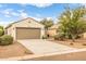 Front exterior view of a single-story home with desert landscaping at 1375 W Belmont Red Trl, San Tan Valley, AZ 85143