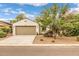 Charming single-story home with a two-car garage and desert landscaping at 1375 W Belmont Red Trl, San Tan Valley, AZ 85143
