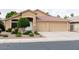 Charming single-story home with a well-maintained front yard and a two-car garage at 1894 E Sagebrush St, Gilbert, AZ 85296