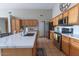Spacious kitchen with stainless steel appliances, long island, and ample cabinet space at 1894 E Sagebrush St, Gilbert, AZ 85296