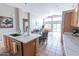Modern open concept kitchen with island and view to dining and living spaces at 1894 E Sagebrush St, Gilbert, AZ 85296