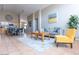 Open-concept living space featuring tile floors and view to dining and kitchen areas at 1894 E Sagebrush St, Gilbert, AZ 85296