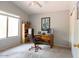 Home office with a window, desk, and storage, perfect for remote work at 1894 E Sagebrush St, Gilbert, AZ 85296