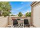 Cozy balcony with seating offers a relaxing outdoor space and neighborhood views at 2035 S Elm St # 211, Tempe, AZ 85282