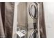 Modern washer and dryer set with convenient shelving in a utility area at 2035 S Elm St # 211, Tempe, AZ 85282
