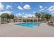 Community pool area with lounge chairs and shaded seating for relaxation at 2035 S Elm St # 211, Tempe, AZ 85282