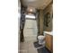 Cozy bathroom featuring a tub with shower curtain, toilet, and wooden vanity with sink at 20669 N 266Th Ave, Buckeye, AZ 85396