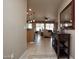 Entrance hall leading to living and dining areas, tiled flooring and natural light at 20669 N 266Th Ave, Buckeye, AZ 85396