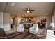Inviting living room with kitchen, dining and sitting areas for gatherings and relaxation at 20669 N 266Th Ave, Buckeye, AZ 85396