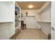 Large walk-in closet with built-in shelving and ample storage space at 20669 N 266Th Ave, Buckeye, AZ 85396