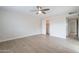 Bright bedroom with ceiling fan and closet space offers a comfortable living area at 2502 S Mollera Cir, Mesa, AZ 85210