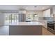 Spacious kitchen with island and backyard view at 2502 S Mollera Cir, Mesa, AZ 85210