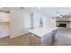 Kitchen island offers seating and extra storage in this beautifully updated home at 2502 S Mollera Cir, Mesa, AZ 85210