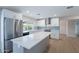 Bright kitchen features a large island, stainless steel appliances, and sleek countertops at 2502 S Mollera Cir, Mesa, AZ 85210