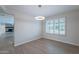 Inviting living area with new floors leads to a view of a fireplace in the room directly behind it at 2502 S Mollera Cir, Mesa, AZ 85210