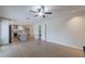 Open living space with fireplace and access to kitchen and laundry at 2502 S Mollera Cir, Mesa, AZ 85210