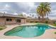 Inviting backyard pool and patio area, perfect for outdoor relaxation and entertaining at 2502 S Mollera Cir, Mesa, AZ 85210