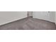 This bedroom features neutral walls, carpet flooring, white doors, and white trim at 2506 N Pony Ln, Casa Grande, AZ 85122