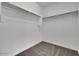Walk-in closet with carpeted flooring and ample storage space at 2506 N Pony Ln, Casa Grande, AZ 85122