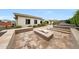 Backyard features a built in fire pit, hot tub, and outdoor seating area at 2735 E King Bird Dr, Gilbert, AZ 85297