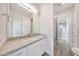 Bright bathroom featuring granite countertops, white cabinets, and tiled floors at 2735 E King Bird Dr, Gilbert, AZ 85297