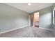 Spacious bedroom with neutral walls and plush carpet flooring leading to an ensuite bathroom at 2735 E King Bird Dr, Gilbert, AZ 85297